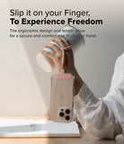 Holder Link Flow Finger Ring - A hand holds a white tumbler while a phone hangs from a pink finger strap loop.