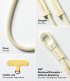 Holder Link Flow Shoulder Strap Y-Type - Close-up of cream polyester strap, zinc alloy stoppers, TPU holder, and connector.