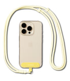 Holder Link Flow Shoulder Strap Y-Type - A clear phone case with a yellow bottom tab attached to a pale yellow Y-shaped lanyard.