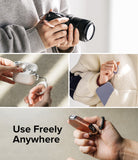 Finger Ring Strap [2 Pack] - Hands using silicone ring straps to carry a camera, AirPods case, wallet, and car key.
