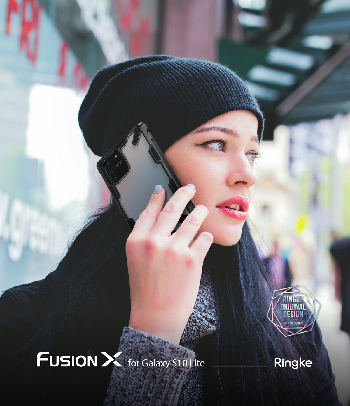 Galaxy S10 Lite Case | Fusion-X - Woman in a black beanie holding a Galaxy S10 Lite with a black Fusion-X protective case.