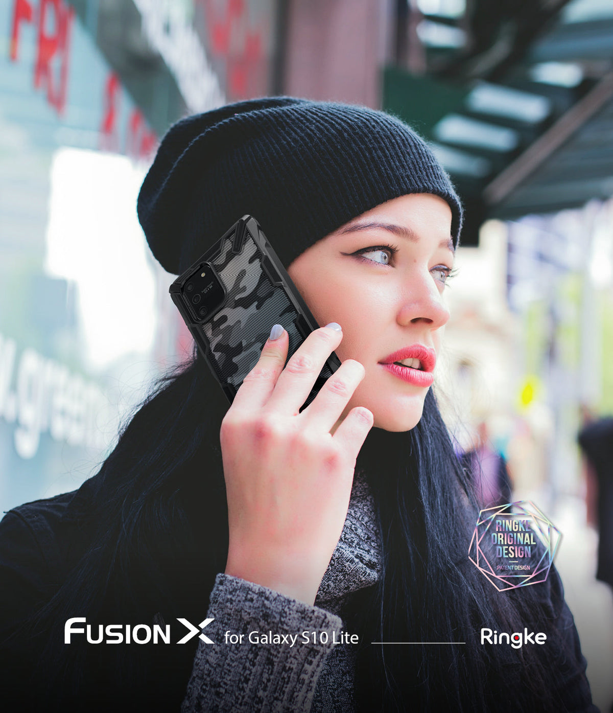 Galaxy S10 Lite Case | Fusion-X - Woman in a black beanie talking on a phone with a black camouflage Fusion-X case.