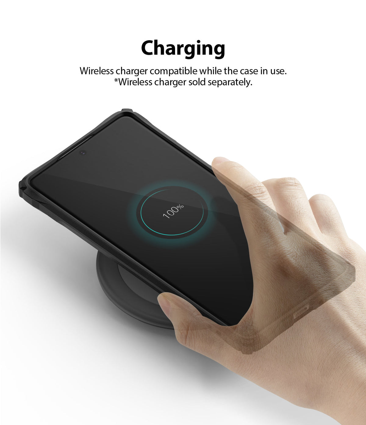 Galaxy S10 Lite Case | Fusion-X - A hand places a phone in a black case onto a wireless charger, showing 100% battery status.