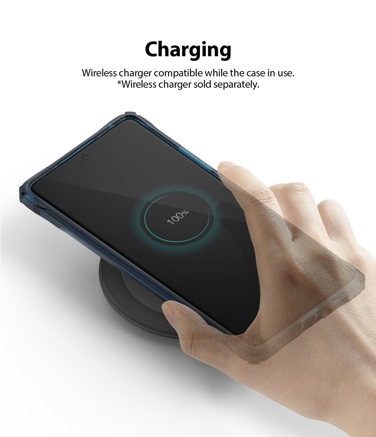 Galaxy S10 Lite Case | Fusion-X - Hand placing a phone with a protective case onto a wireless charging pad.
