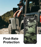 Galaxy A14 Case | Fusion-X - Camouflage phone case with black bumpers held by a driver in a Jeep, text reads First-Rate Protection.