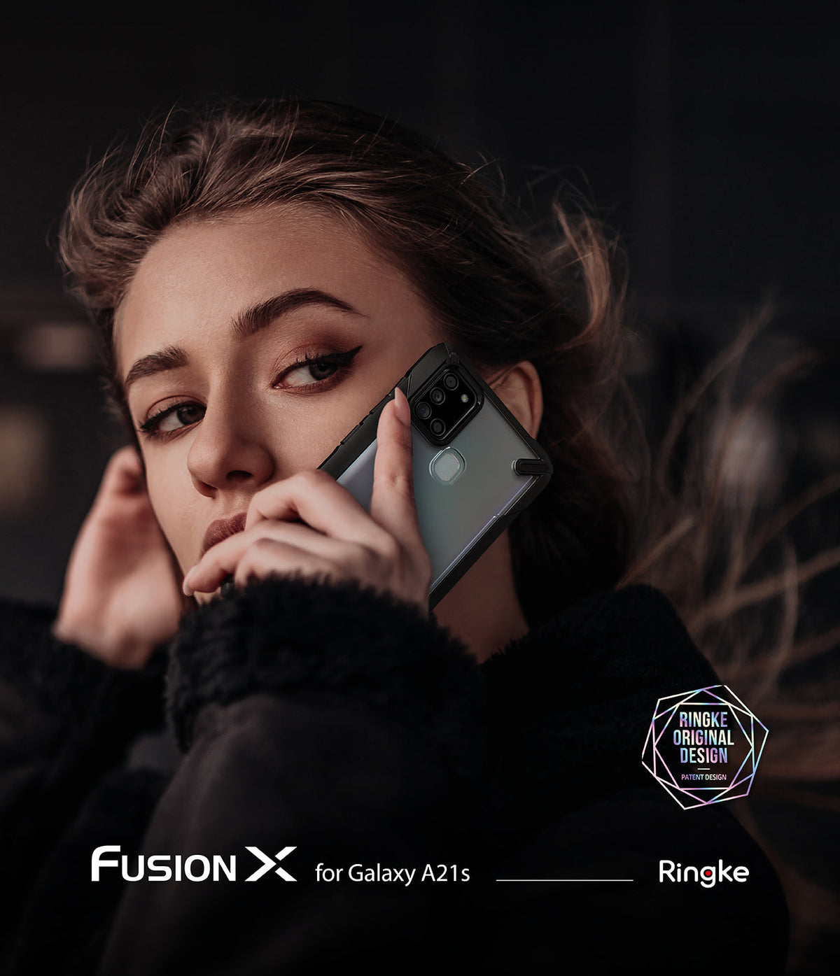 Galaxy A21s Case | Fusion-X - Woman holding a Galaxy A21s in a black Fusion-X protective case against her cheek.