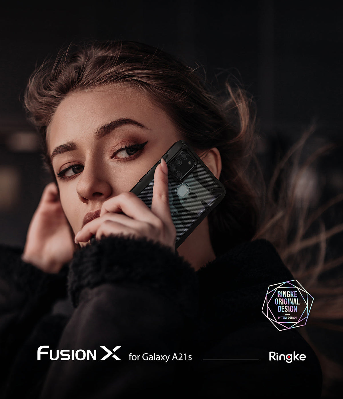 Galaxy A21s Case | Fusion-X - Woman holding a camo-patterned Fusion-X phone case against her cheek.