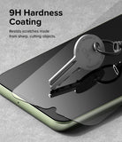 Galaxy A24 4G(LTE) Screen Protector | Full Cover Glass (2 Pack) - Galaxy A24 4G(LTE) Screen Protector - A metal key resting on a smartphone screen protector, demonstrating 9H scratch resistance.