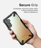 Galaxy A34 Case | Fusion-X - Hand holding a Samsung Galaxy A34 in a black protective case with a gradient back panel.