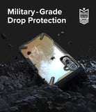 Galaxy A34 Case | Fusion-X - Protective phone case on dark, rocky ground with military-grade drop protection text and badge.