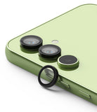 Galaxy A54 5G Camera Lens Protector | Camera Lens Frame Glass - Galaxy A54 5G Camera Lens Protector - Black circular lens protector ring positioned near a light green smartphone camera.