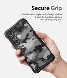 Galaxy A54 Case | Fusion-X - Hand holding a phone with a black and white camo case featuring a rugged, ergonomic frame.