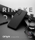 Galaxy A73 5G Case | Onyx - Matte black textured phone case for Galaxy A73 5G on a dark surface with branding and accessories.