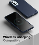 Galaxy A73 5G Case | Onyx - Navy blue phone case on a Galaxy A73 charging wirelessly on a pad showing 100% battery.
