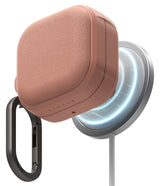 Samsung Galaxy Buds On / 4 Pro / 4 Case | Onyx Magnetic - Dusty pink textured case magnetically attached to a glowing wireless charger.