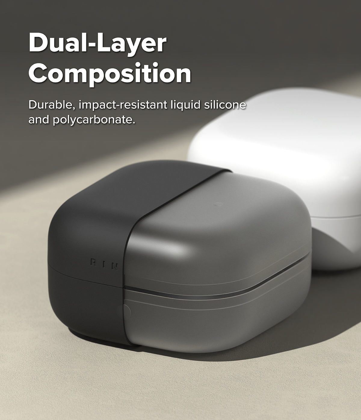 Galaxy Buds 4 Pro / 4 Case | Silicone - Dual-layer black and grey protective case for Galaxy Buds on a neutral surface.