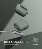 Galaxy Buds 3 Pro / 3 / 3 FE | Onyx Magnetic - Two sage green textured earbud cases floating above a magnetic charger.