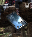 Galaxy M31 Case | Fusion-X - Black protective phone case falling against a blurred forest background with military-grade certification.