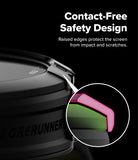 Forerunner 165 / 170 / 70 Bezel Styling | Bezel Styling - Close-up of a black cylindrical product with raised edges and a circular inset showing a pink and green screen protector design, with text reading 'Contact-Free Safety Design' on a black background.