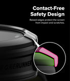 Forerunner 165 / 170 / 70 Bezel Styling | Bezel Styling - Close-up of a black cylindrical product with raised edges and a circular inset showing a pink and green screen protector design, with text reading 'Contact-Free Safety Design' on a black background.