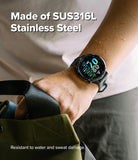 Forerunner 970 | Bezel Styling - A Garmin watch with a stainless steel bezel worn on a wrist with water droplets on the skin.