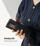 Galaxy Note 20 Ultra Case | Folio Signature Black - Person holding a black textured folio case with precise camera cutouts.