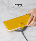 Galaxy Note 20 Ultra Case | Folio Signature Yellow - Hand placing a yellow textured folio case on a wireless charger.