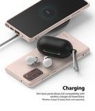 Galaxy Note 20 Case | Air-S - Pink phone case on a wireless charger with earbuds charging on its back via PowerShare.