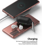 Galaxy Note 20 Case | Air - A phone in a clear case wirelessly charging earbuds placed on its back panel.