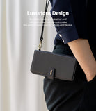 Galaxy Note 20 Case | Folio Signature Black - Person wearing a black leather folio phone case with gold hardware.