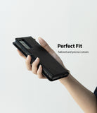 Galaxy Note 20 Case | Folio Signature Black - Hand holding a black textured folio case with precise camera cutouts.
