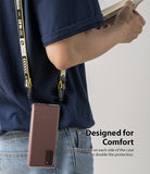Galaxy Note 20 Case | Fusion Matte - Person wearing a phone case with a yellow lanyard attached to side holes.