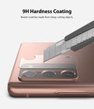 Galaxy Note 20 Camera Protector | Invisible Defender Glass - Galaxy Note 20 Camera Protector - A utility knife blade scrapes against a transparent glass protector on a phone camera.