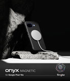 Google Pixel 10a Case | Onyx Magnetic - Black phone case with magnetic charger attached, resting on a stone against a dark backdrop.