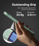 Google Pixel 10a Case | Onyx - Hand holding a slim green phone case with textured grip, showing 33.8g weight and 2.0mm thickness.