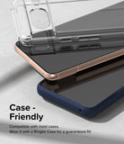 Google Pixel 8 Screen Protector | Dual Easy Film - A smartphone with a clear case resting on a blue phone case.