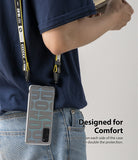 Galaxy S20 FE Case | Fusion Design - Person wearing a phone case with a yellow and black lanyard attached to both sides.
