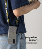 Galaxy S20 FE Case | Fusion Design - Person wearing a phone case with a yellow lanyard attached to dual side holes.