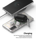 Galaxy S20 FE Case | Fusion Design - Clear phone case on a wireless charger with Galaxy Buds case charging on top.