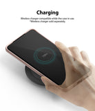 Galaxy S20 Ultra Case | Air-S - Hand placing a phone in a protective case onto a wireless charging pad showing 100% charge.