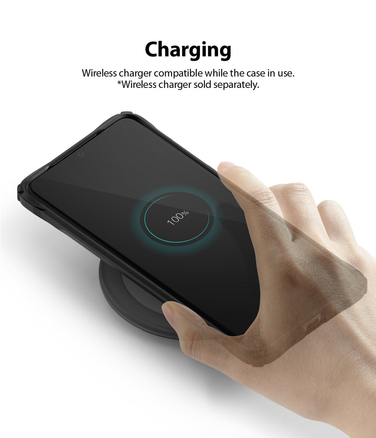 Galaxy S20 Ultra Case | Fusion-X - A hand places a phone in a black case onto a wireless charger, showing a 100% charge icon.