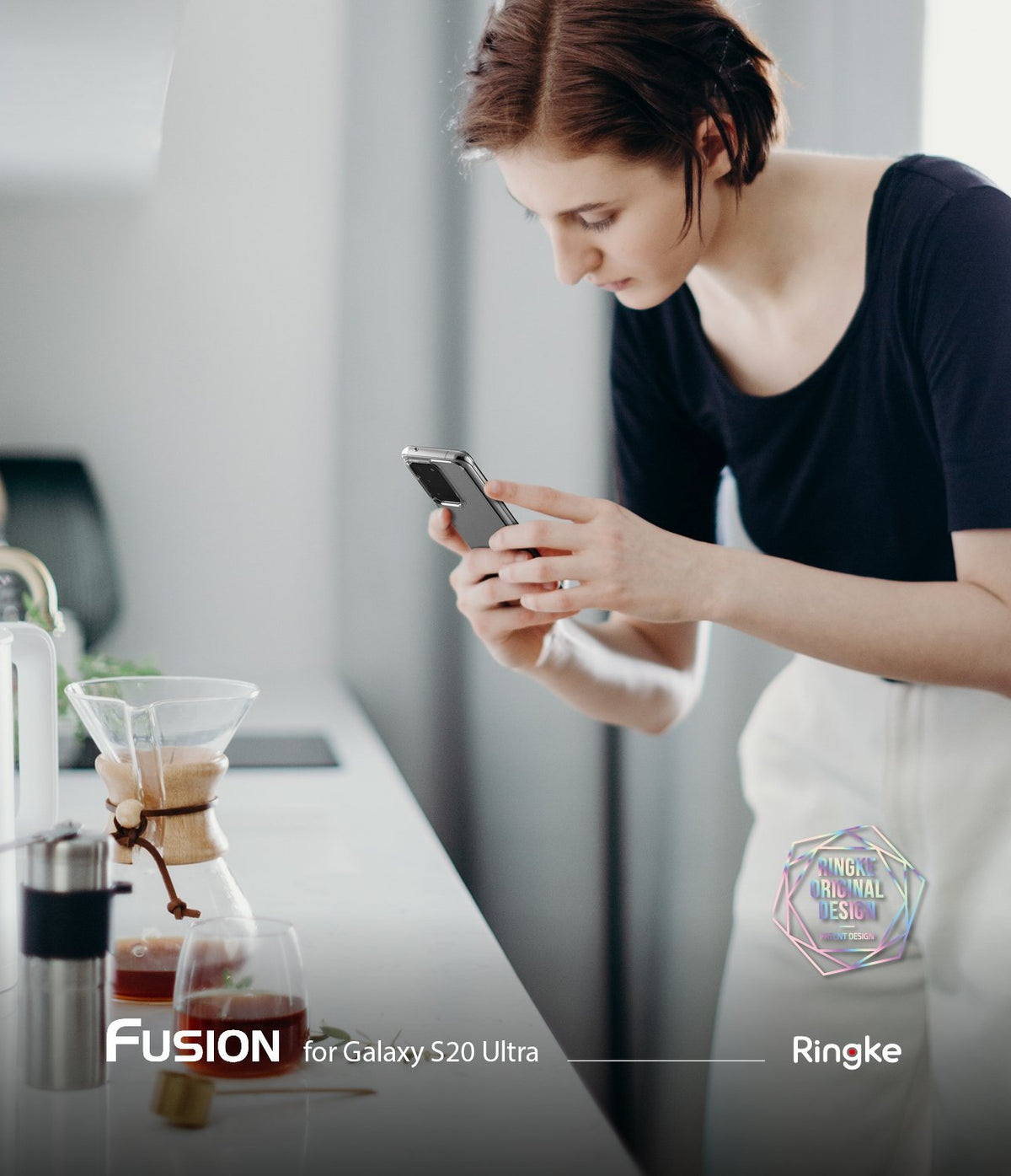 Galaxy S20 Ultra Case | Fusion - Woman in a kitchen using a clear-cased Galaxy S20 Ultra to photograph coffee equipment.