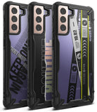 Galaxy S21 Plus Case | Fusion-X Design - Three Galaxy S21 Plus phones with black rugged cases featuring unique graphic back designs.