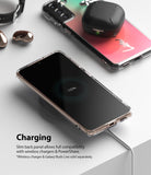 Galaxy S21 Plus Case | Fusion Design - A Galaxy S21 Plus in a clear case wirelessly charging on a white surface.