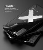 Galaxy S21 Plus Case | Onyx Design - A flexible black TPU phone case with a white cross graphic being pulled off a phone.