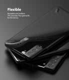Galaxy S21 Plus Case | Onyx - A flexible black TPU case being pulled away from a Galaxy S21 Plus smartphone.