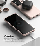 Galaxy S21 Ultra Case | Air-S - Pink phone case on a wireless charger with a 100% battery icon and earbuds on top.