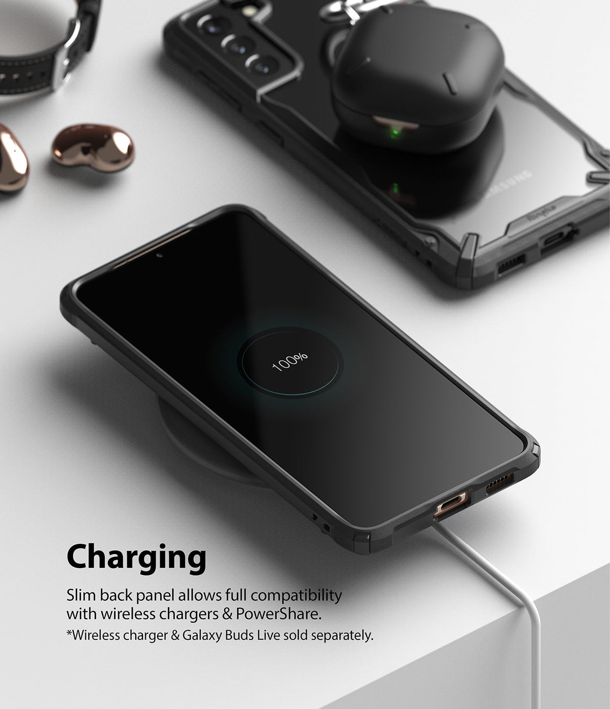 Galaxy S21 Case | Fusion-X - A phone in a black case wirelessly charging with a 100% battery icon displayed on the screen.