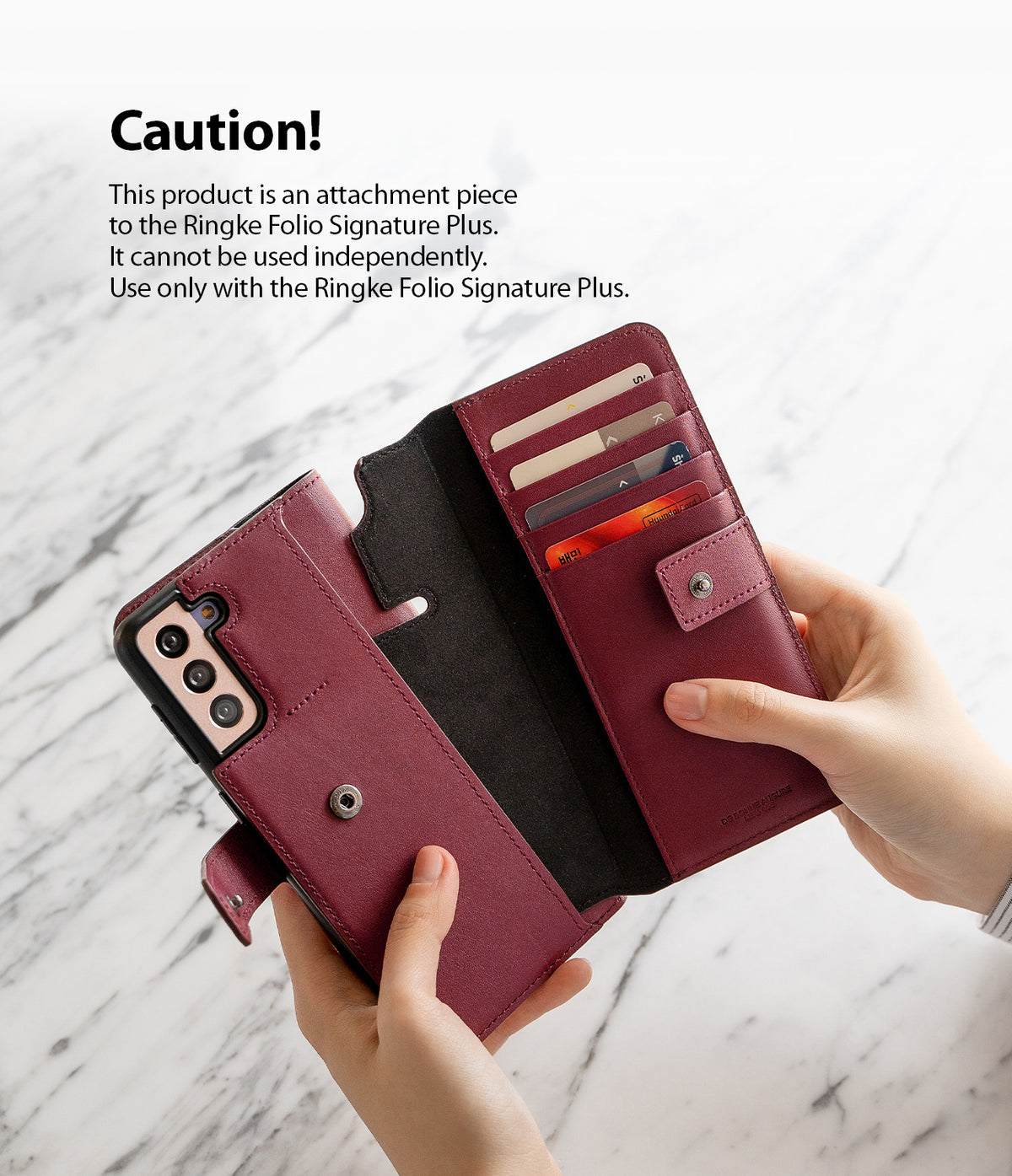 Galaxy S21 Case | Folio Signature+ - Hands holding a maroon leather folio phone case with card slots and a snap closure.
