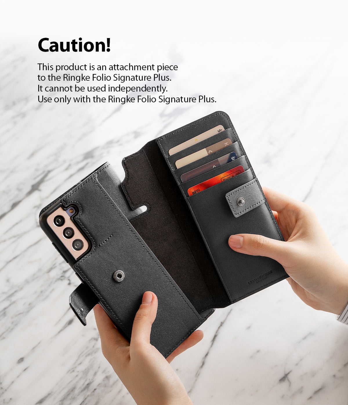 Galaxy S21 Case | Folio Signature+ - Hands holding a black leather folio phone case with card slots and a caution notice.